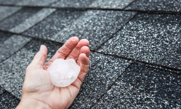 a big hail on human palm