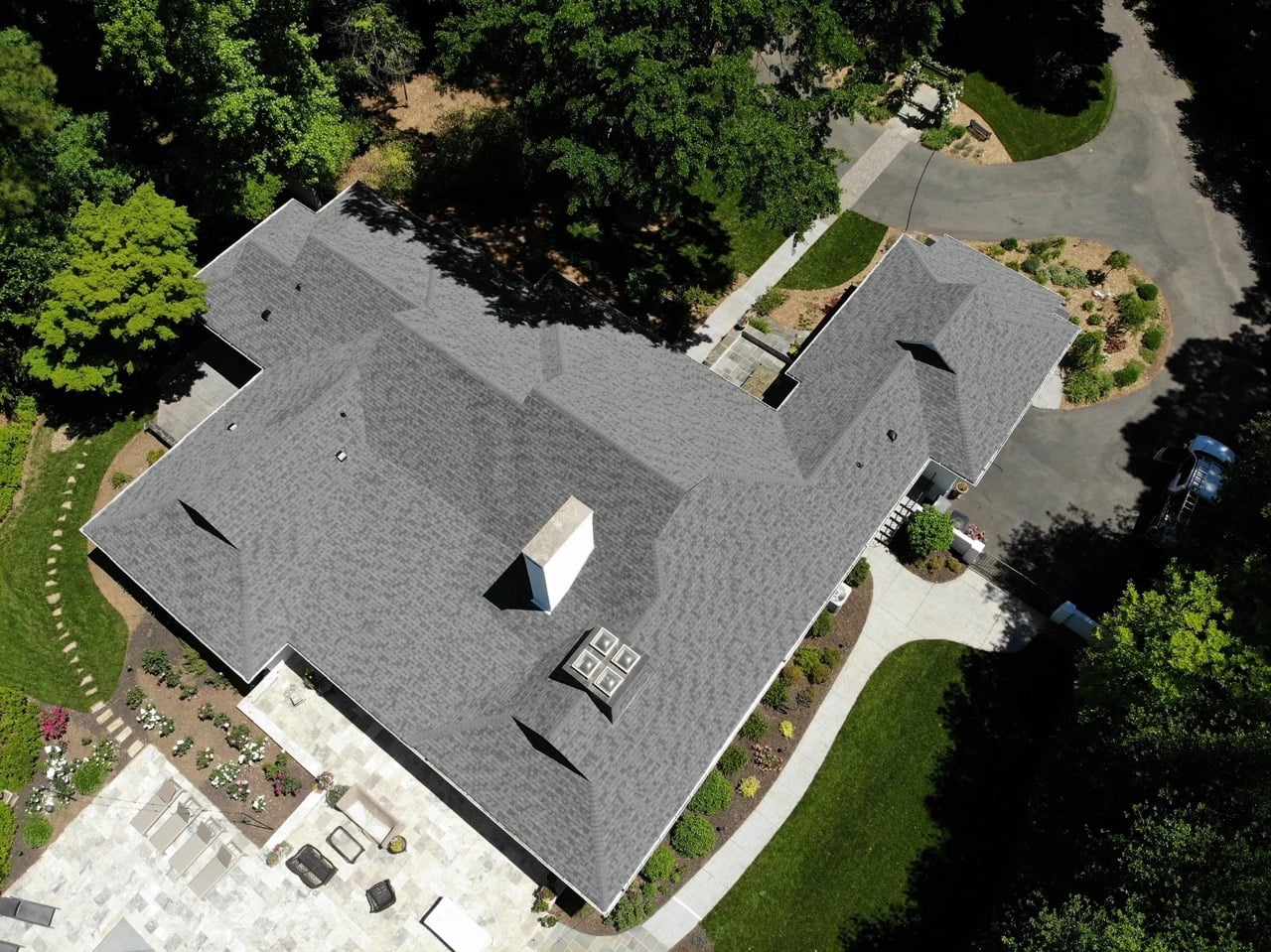 aerial view of asphalt roofing home
