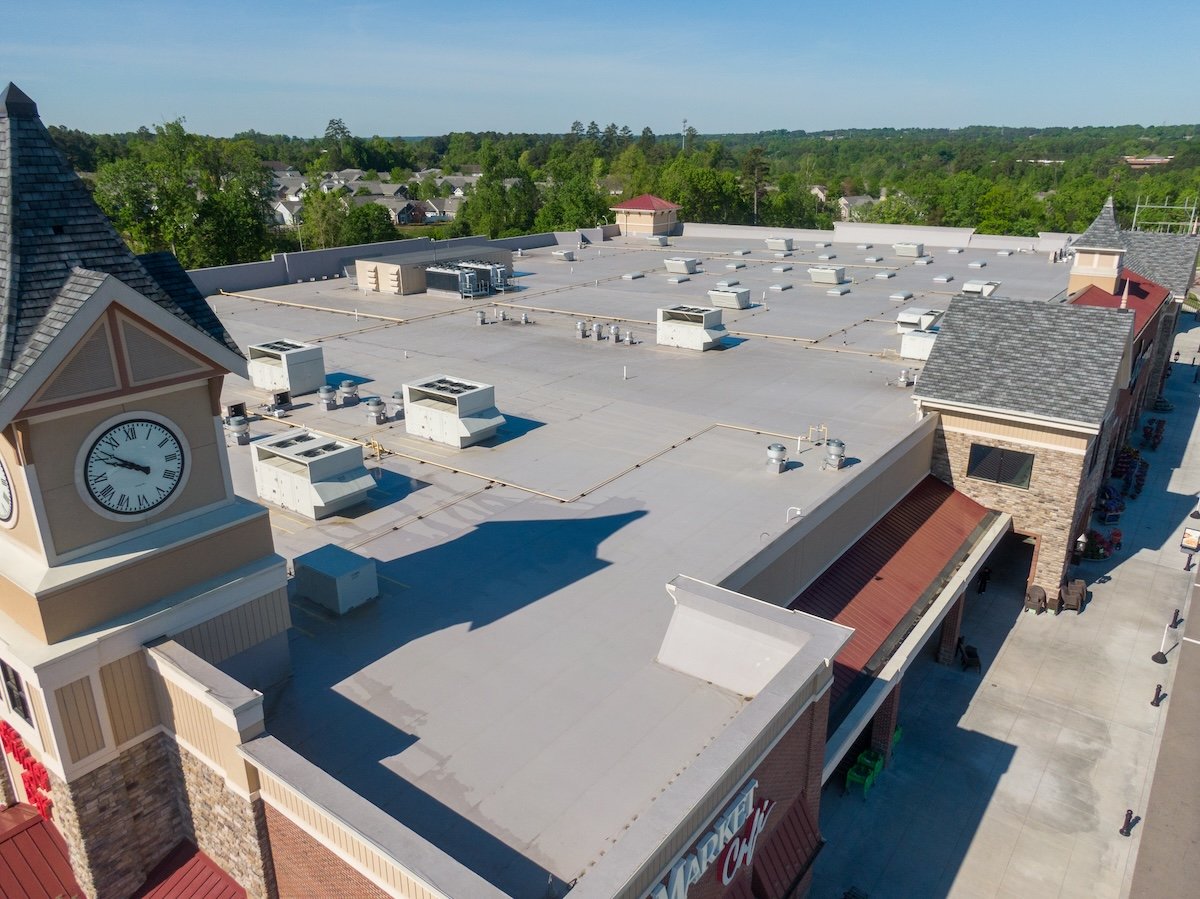 Drone Images of TPO Flat Commercial Roof With Metal Panels: New & Existing Construction