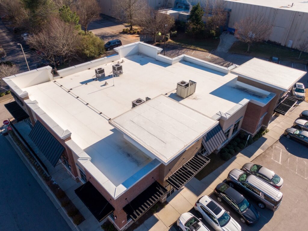 Matthews NC commercial roof installation with durable flat roofing system