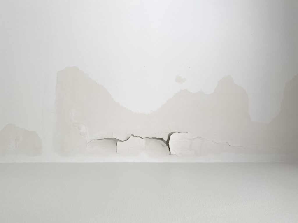 ceiling leaking in apartment whitewash and plaster of ceiling crack and break from rain leakage from roof or top floor