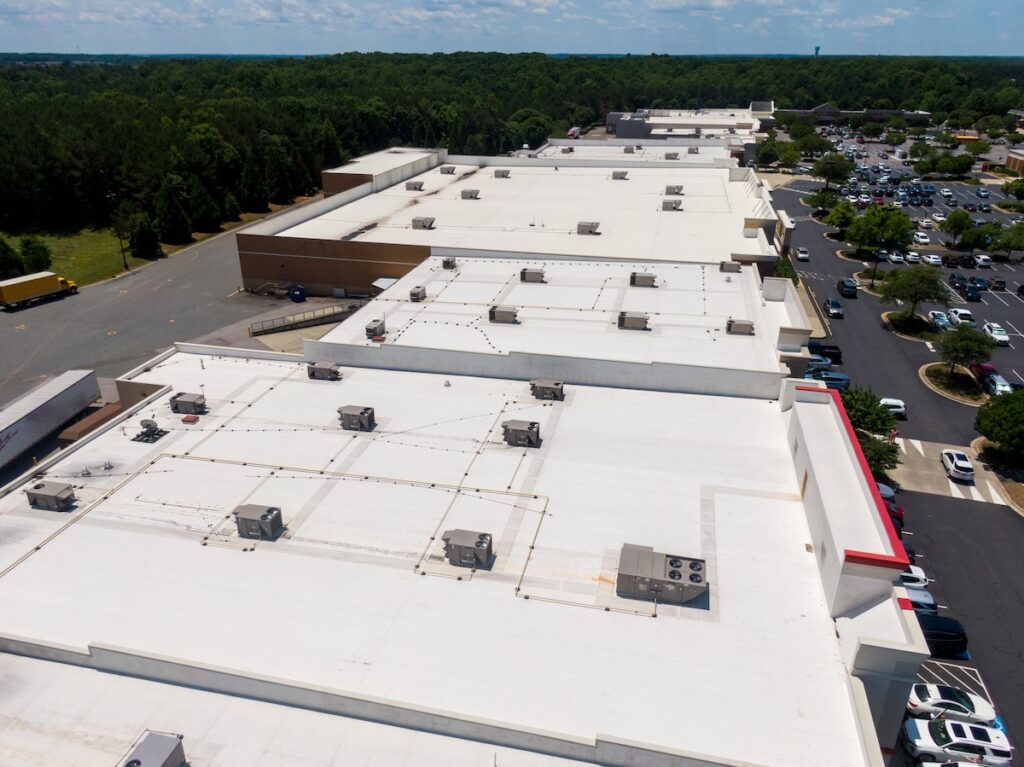 commercial roof warranty Drone Images of Commercial Roofs Featuring TPO and Asphalt Shingles: Midday, Sunny, No People
