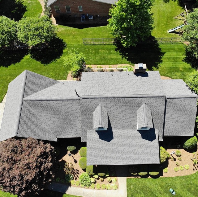 sunny day aerial view of asphalt roofing nc