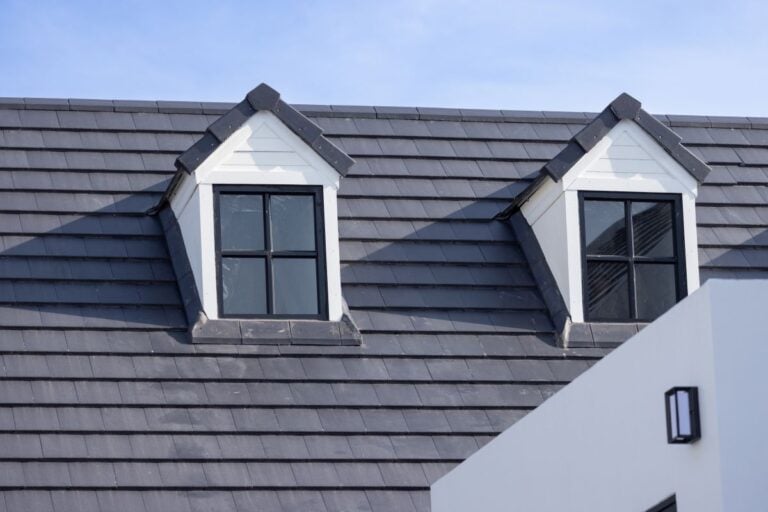 new slate roof big white house squared windows