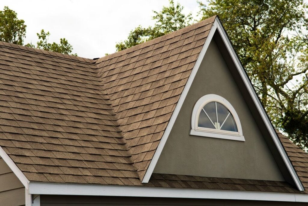 are gaf shingles good light brown big house green wall white window