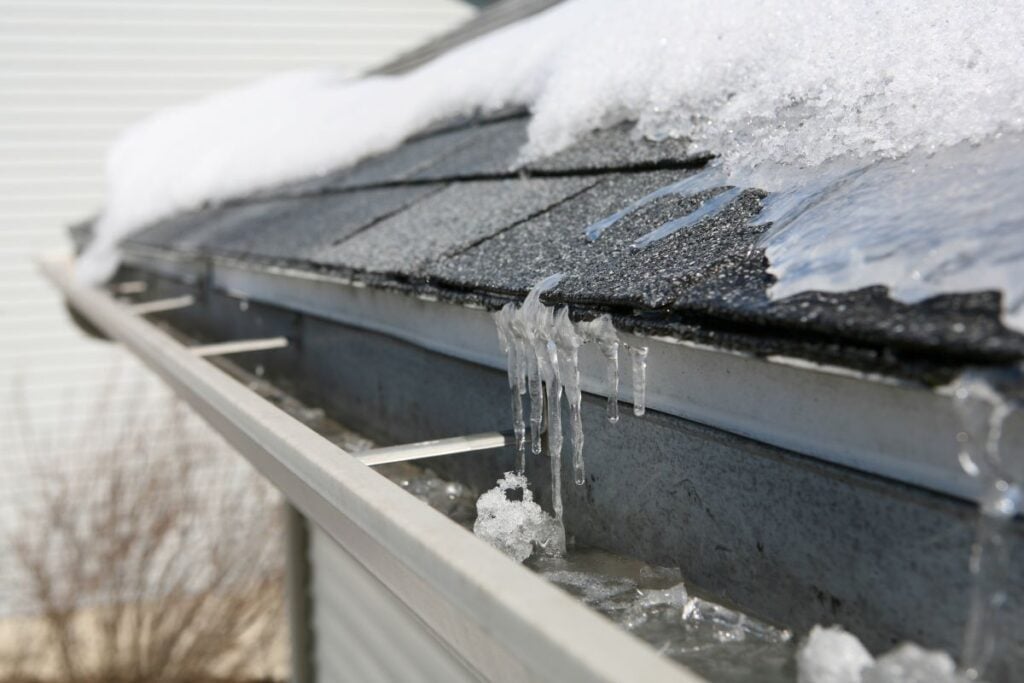 clogged gutters ice blocking water system