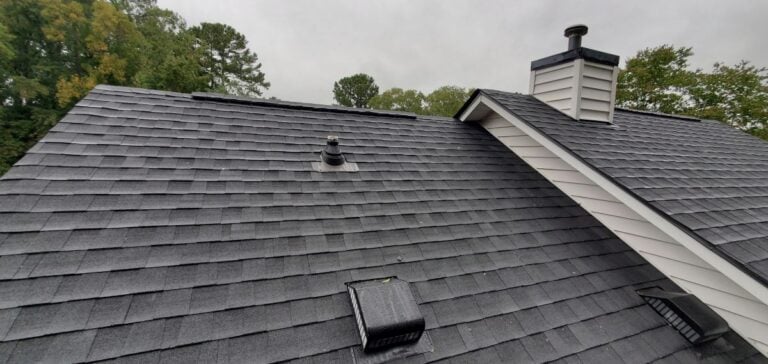 how to install architectural shingles close up charcoal roof white sliding