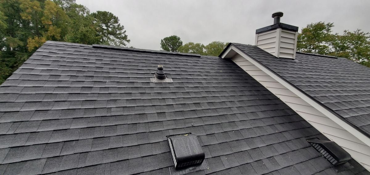 how to install architectural shingles close up charcoal roof white sliding