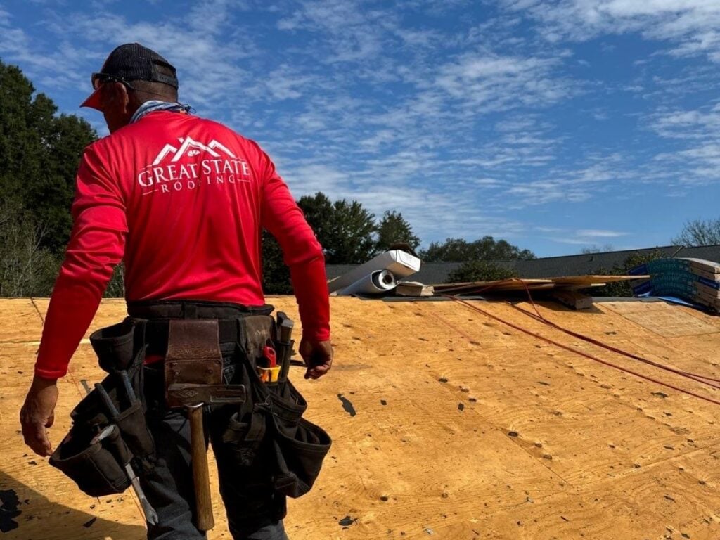 asphalt roofing contractor Great State Roofing worker replacing roof