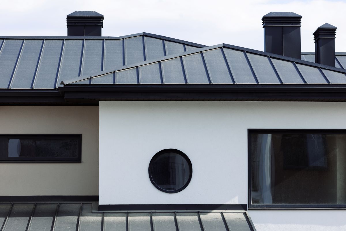 Charlotte NC metal roofing contractor installing standing seam roof