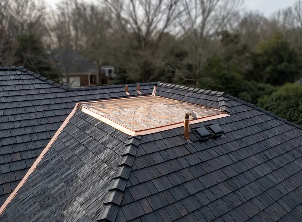 Brava composite cedar shake and custom copper roofing
