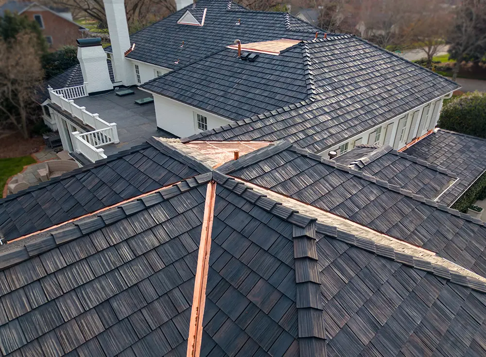 Aging shingle roof before replacement in Charlotte