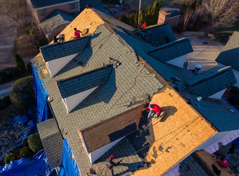 Copper accent roof replacement in Greensboro Country Club neighborhood